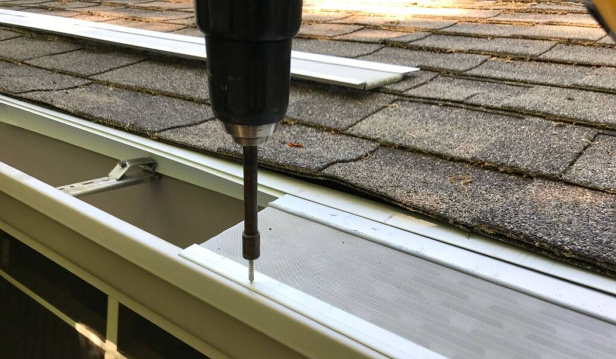 drilling gutter guards with an electric drill