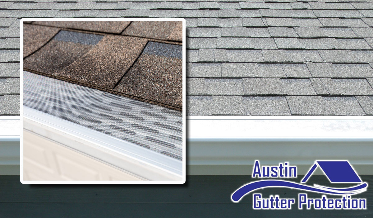 Home roof with shingles and gutter guards on the gutters. Get reliable gutter protection for Austin homes.