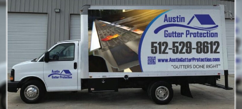 A company truck of a gutter company. Contact details of Austin Gutter Protection.