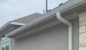Seamless gutter and downspout.
