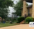 Technician performing Austin gutter repair at a residential property, showcasing professional gutter repair Austin and gutter protection service.